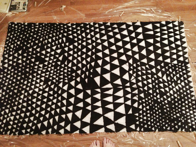 Hand-painted black and white triangles on fabric